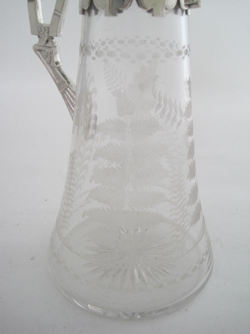 VICTORIAN SILVER PLATED CLARET JUG WITH CAST FLUTED SPOUT AND AN UNUSUAL STYLISED HANDLE - ADDITIONAL PHOTO 5