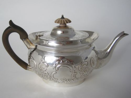 pretty edwardian silver tea pot in an oval boat shape - CATEGORY: ANTIQUE SILVER - DATED 1910