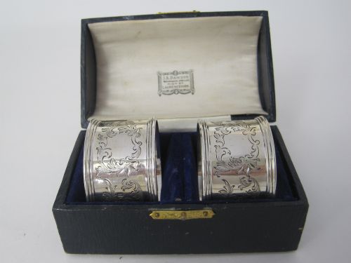 PAIR OF ANTIQUE SILVER NAPKIN RINGS IN BLUE VELVET LINED BOX - ADDITIONAL PHOTO 1