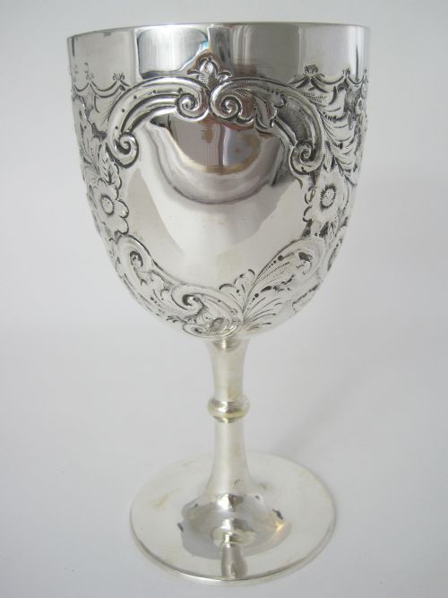 EDWARDIAN SILVER GOBLET WITH A CHASED FLORAL AND SCROLL BODY - ADDITIONAL PHOTO 1