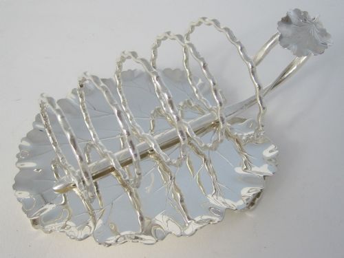 decorative victorian hukin heath silver plated toast rack - CATEGORY: ANTIQUE SILVER - DATED 1890