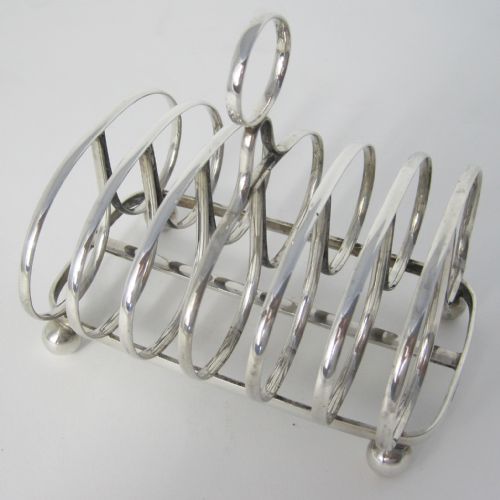georgian style silver toast rack with seven bar butterfly style divisions - CATEGORY: ANTIQUE SILVER - DATED 1900