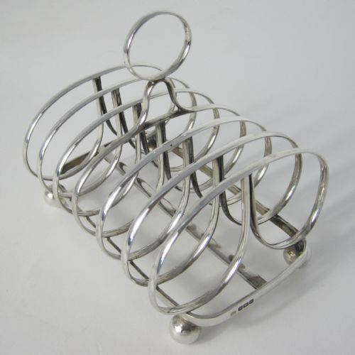 GEORGIAN STYLE SILVER TOAST RACK WITH SEVEN BAR BUTTERFLY STYLE DIVISIONS - ADDITIONAL PHOTO 1