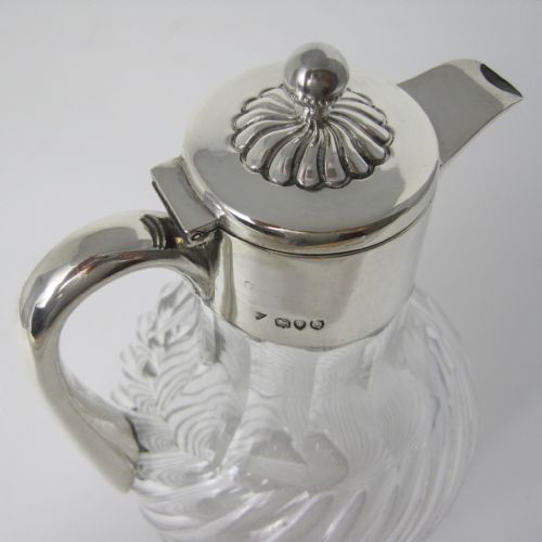 VICTORIAN SILVER MOUNTED CLARET JUG WITH CLEAR GLASS OVOID SHAPE SPIRAL CUT BODY - ADDITIONAL PHOTO 1