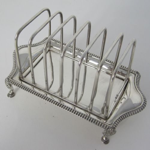 georgian style silver toast rack with six wirework divisions - CATEGORY: ANTIQUE SILVER - DATED 1930