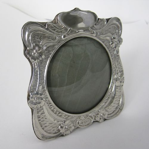 art nouveau style silver photo frame with a circular domed glass window - CATEGORY: ANTIQUE SILVER - DATED 1900