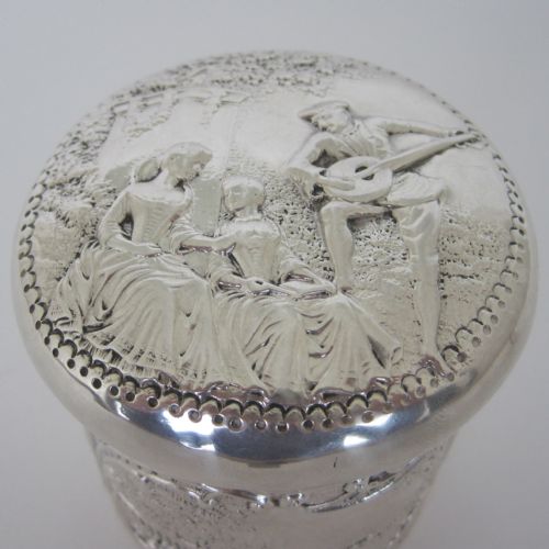 DECORATIVE VICTORIAN SILVER VANITY JAR OR BOX WITH MUSICAL THEME EMBOSSED LID - ADDITIONAL PHOTO 1