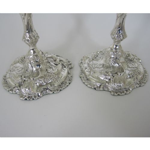 PAIR OF LATE VICTORIAN ROCOCO STYLE SILVER PLATED CANDLE STICKS - ADDITIONAL PHOTO 1