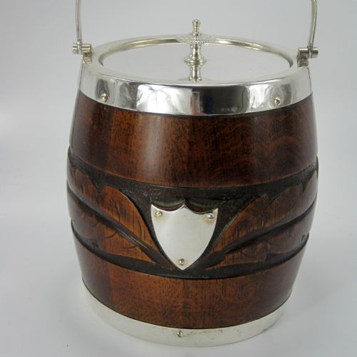 EDWARDIAN SILVER PLATE AND CARVED OAK BARREL WITH CARVED BAND OF FOLIAGE - ADDITIONAL PHOTO 1