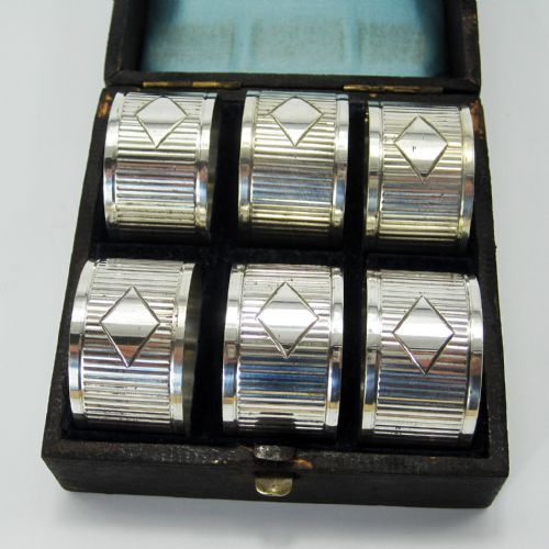 BOXED SET OF SIX VICTORIAN SILVER PLATED NAPKIN RINGS - ADDITIONAL PHOTO 1