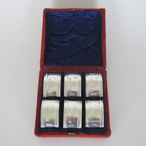 boxed set of six aesthetic movement silver plated napkin rings - CATEGORY: ANTIQUE SILVER - DATED 1890