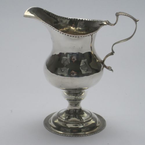 GEORGE III SILVER CREAM JUG IN AN INVERTED PEAR SHAPE - ADDITIONAL PHOTO 1