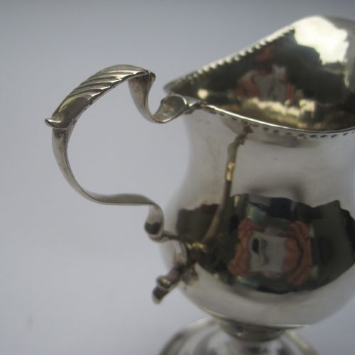 GEORGE III SILVER CREAM JUG IN AN INVERTED PEAR SHAPE - ADDITIONAL PHOTO 4