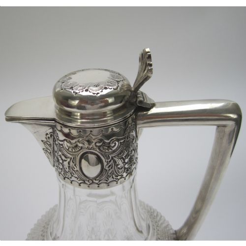 LATE VICTORIAN SILVER AND CUT GLASS CLARET JUG WITH HINGED DOMED FLORAL LID - ADDITIONAL PHOTO 2