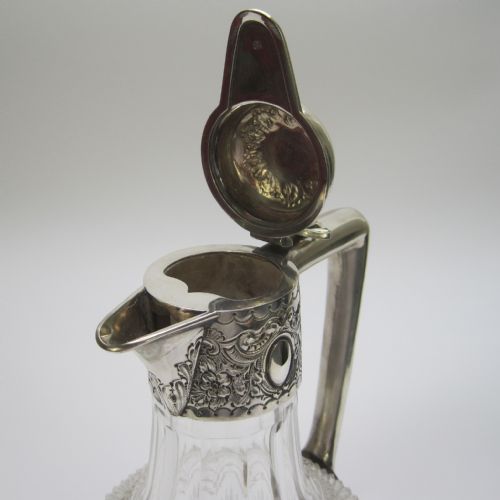 LATE VICTORIAN SILVER AND CUT GLASS CLARET JUG WITH HINGED DOMED FLORAL LID - ADDITIONAL PHOTO 4