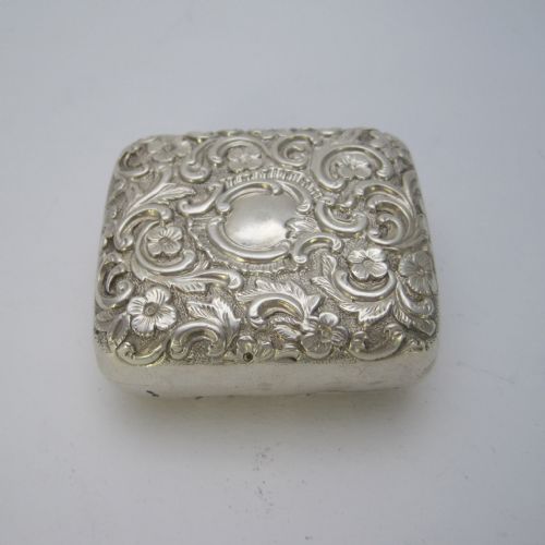 VICTORIAN SILVER PILL OR TRINKET BOX EMBOSSED WITH SCROLLS AND FLOWERS - ADDITIONAL PHOTO 1