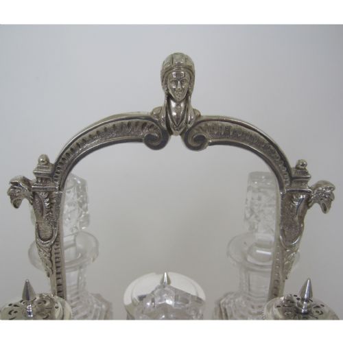 6 BOTTLE VICTORIAN SILVER PLATED CRUET SET WITH LOOP CAST FIGURAL HANDLE - ADDITIONAL PHOTO 2