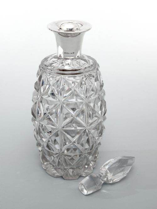 HEAVY SILVER MOUNTED DECANTER WITH A GLASS BARREL SHAPED BODY - ADDITIONAL PHOTO 1