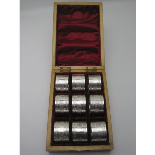 boxed set of nine edwardian silver napkin rings in inlaid wooden box - CATEGORY: ANTIQUE SILVER - DATED 1910