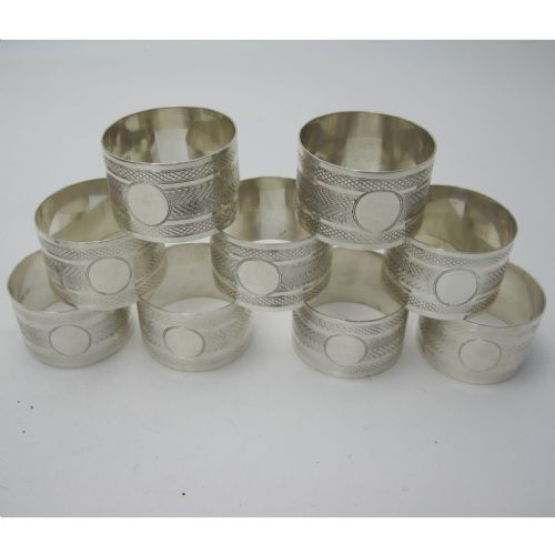 BOXED SET OF NINE EDWARDIAN SILVER NAPKIN RINGS IN INLAID WOODEN BOX - ADDITIONAL PHOTO 2