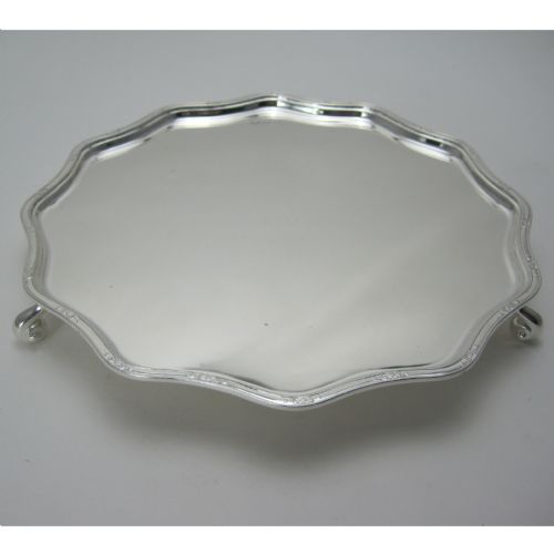 elegant silver salver with a raised delicate floral border - CATEGORY: ANTIQUE SILVER - DATED 1920