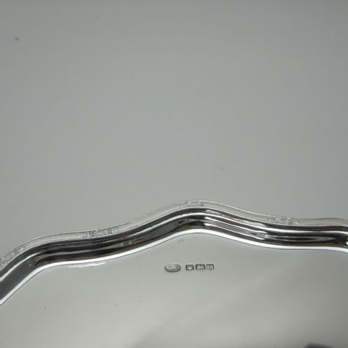 ELEGANT SILVER SALVER WITH A RAISED DELICATE FLORAL BORDER - ADDITIONAL PHOTO 1