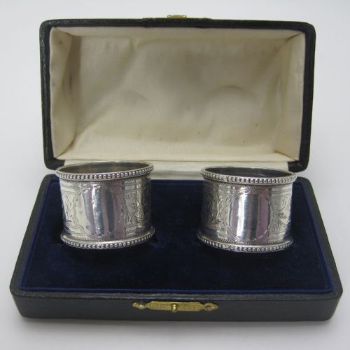 boxed pair of good quality circular victorian silver napkin rings - CATEGORY: ANTIQUE SILVER - DATED 1890