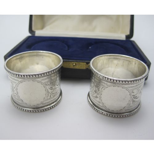 BOXED PAIR OF GOOD QUALITY CIRCULAR VICTORIAN SILVER NAPKIN RINGS - ADDITIONAL PHOTO 1