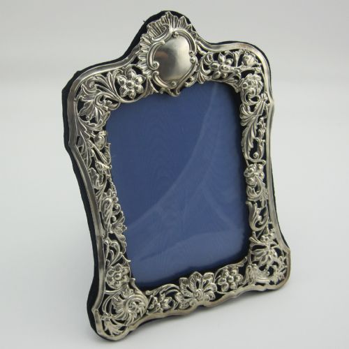 silver photo frame with floral and foliage embossed border - CATEGORY: ANTIQUE SILVER - DATED 1910