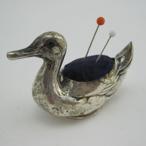 well modelled silver duck pin cushion with glass eyes - CATEGORY: ANTIQUE SILVER - DATED 1920