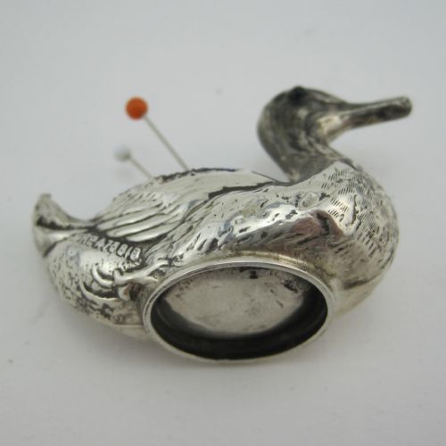 WELL MODELLED SILVER DUCK PIN CUSHION WITH GLASS EYES - ADDITIONAL PHOTO 1
