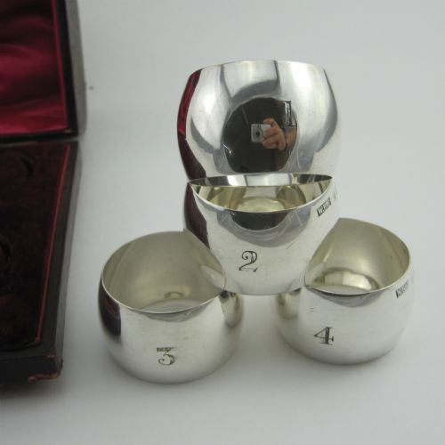 BOXED SET OF FOUR EDWARDIAN PLAIN SILVER NAPKIN RINGS - ADDITIONAL PHOTO 1