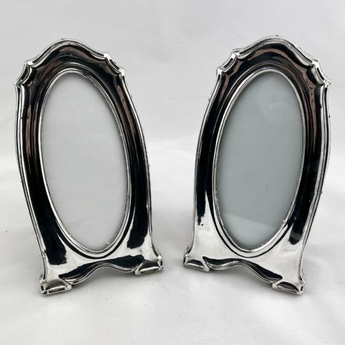 pair of antique oval sterling silver photo frames - CATEGORY: ANTIQUE SILVER - DATED 1910