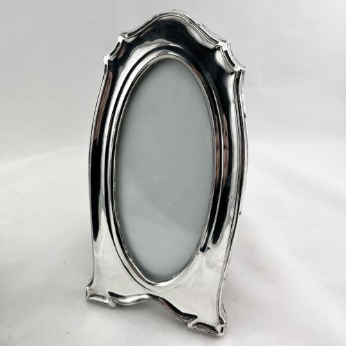 PAIR OF ANTIQUE OVAL STERLING SILVER PHOTO FRAMES - ADDITIONAL PHOTO 1
