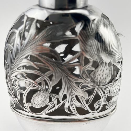 FLORAL PATTERN OVAL STERLING SILVER HIP FLASK - ADDITIONAL PHOTO 1
