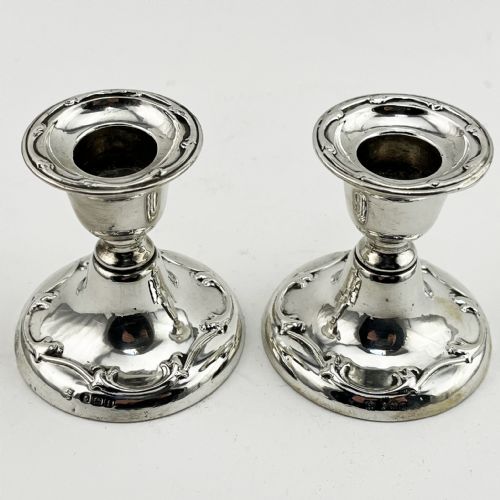 PAIR OF EDWARDIAN STERLING SILVER DWARF CANDLESTICKS