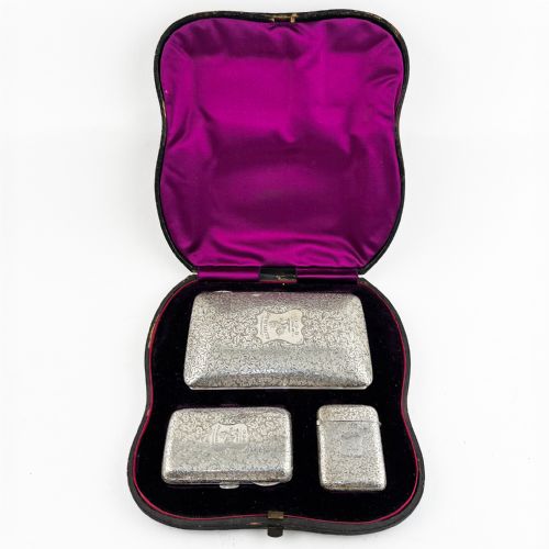 unusual sterling silver cased set of matching smokers cases - CATEGORY: ANTIQUE SILVER - DATED 1880