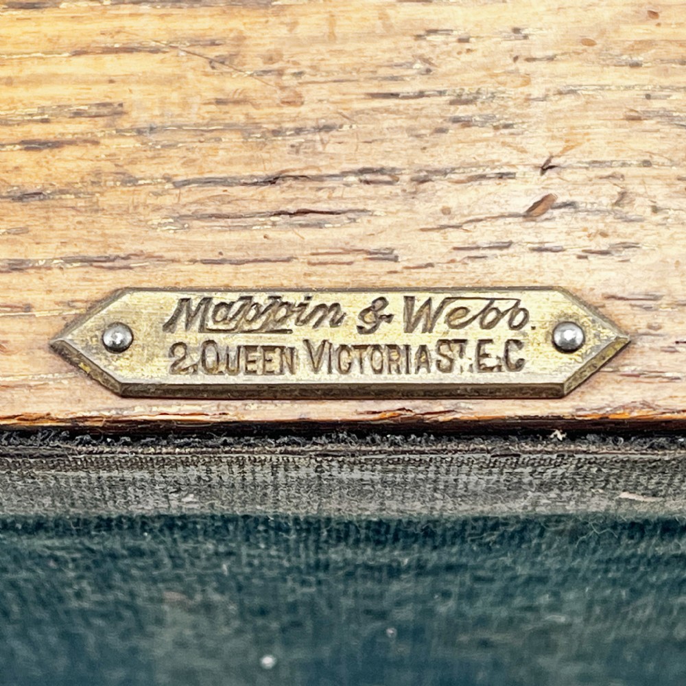 A rectangular oak wood box featuring sterling silver corner mounts and a central silver handle on the lid. View VIII