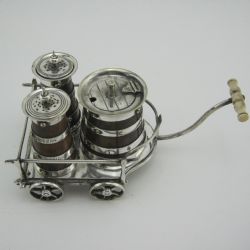VICTORIAN OAK AND SILVER PLATED BARROW FORM CONDIMENT SET