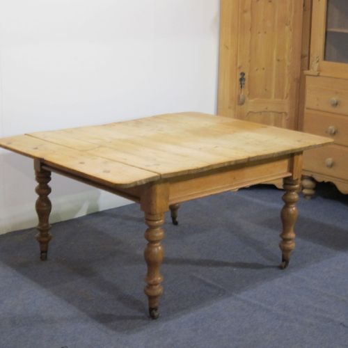 A Large Rustic Victorian Farmhouse Kitchen Table