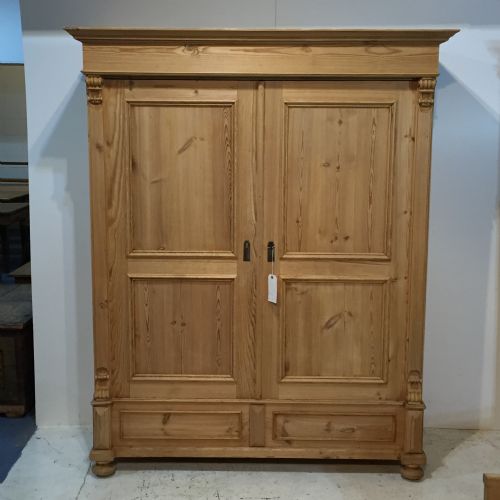 A Large, Low, Antique Pine Wardrobe
