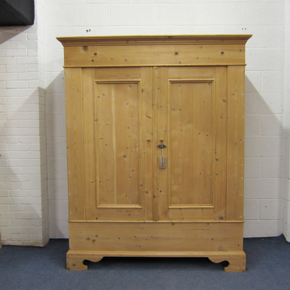 Large antique pine double wardrobe