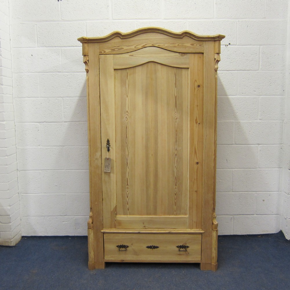 Old pine children's wardrobe with a bottom drawer