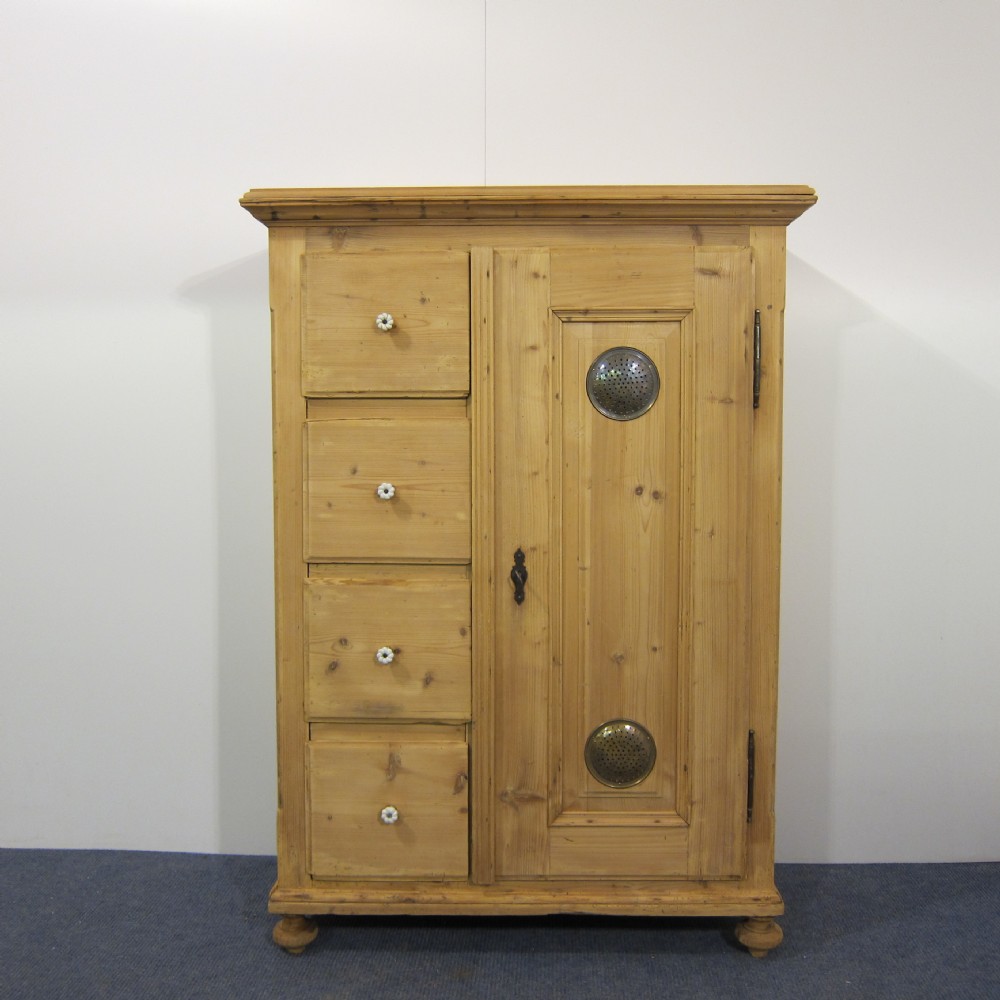 Antique pine larder cupboard with 4 drawers