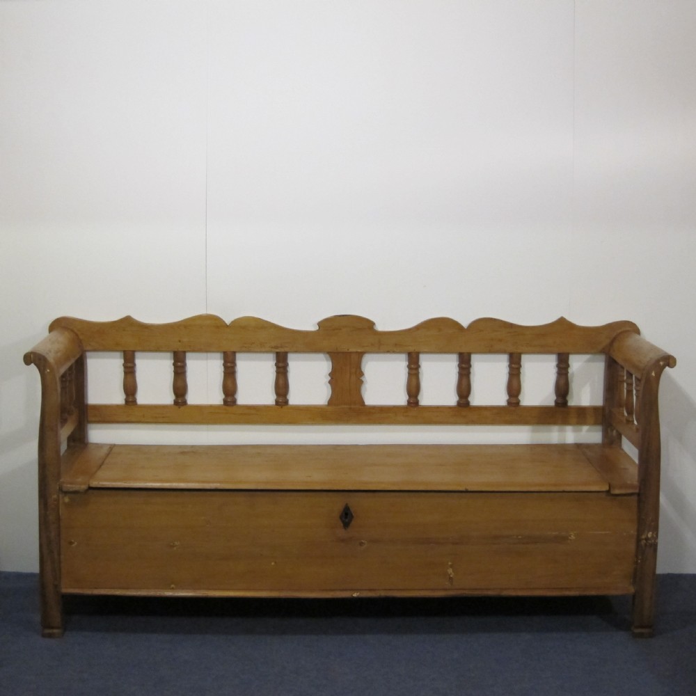 Large antique pine bench with lift up seat