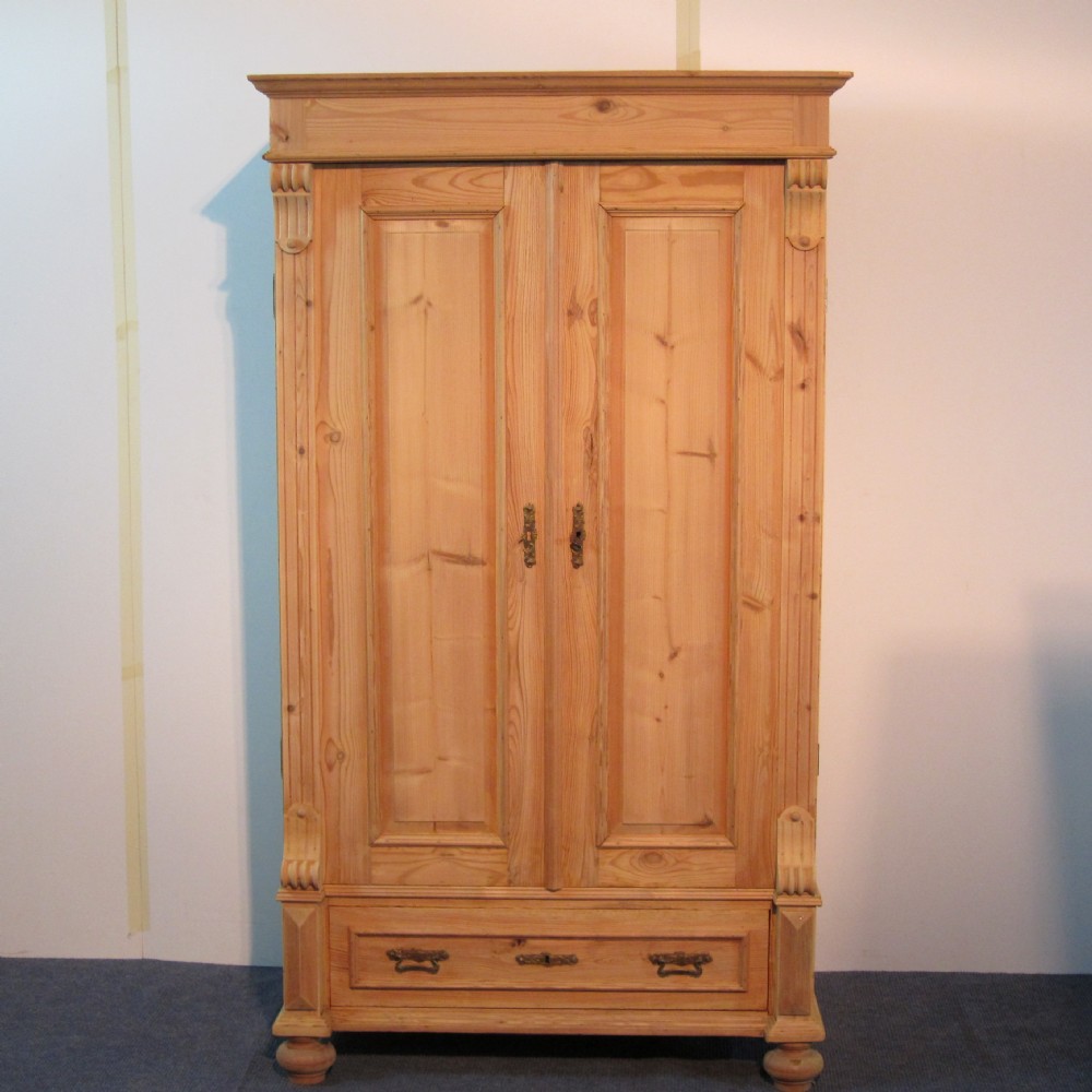 Single antique pine wardrobe with bottom drawer
