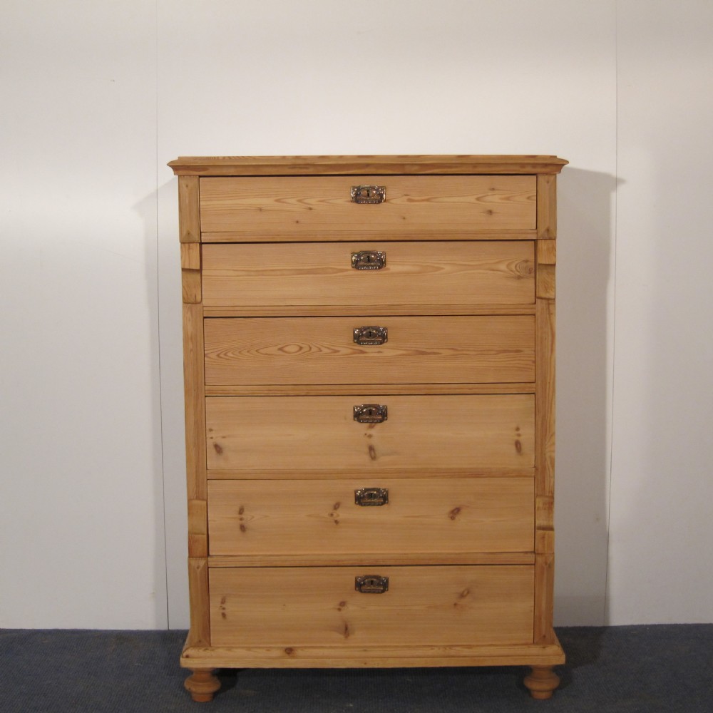 Tall slim old pine chest of drawers