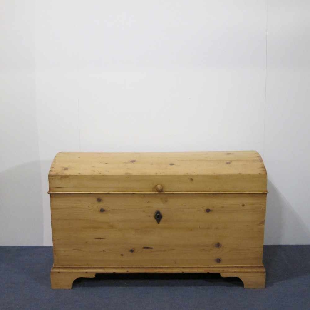 Very large antique pine dome chest