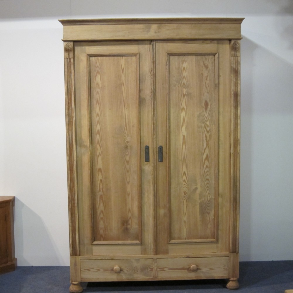 Small antique pine wardrobe with 2 bottom drawers