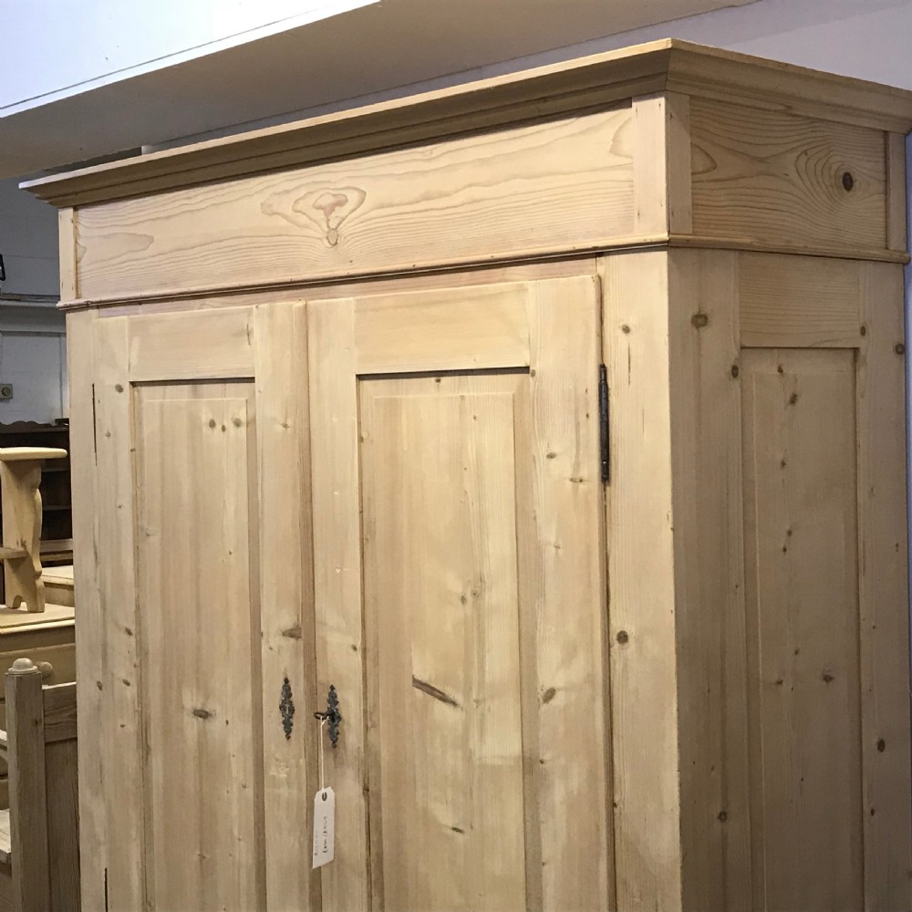A DEEP DOUBLE ANTIQUE PINE WARDROBE (DISMANTLES) View IV